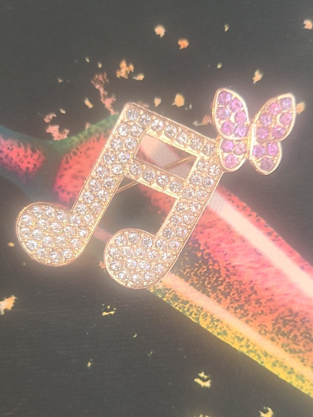 Gold-Tone Crystal Music Note Brooch with Pink Butterfly Accent